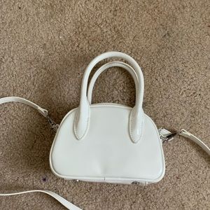 urban outfitters mini white bag